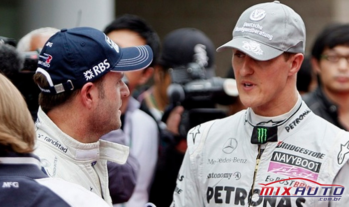 Rubens Barrichello e Michael Schumacher conversando nos bastidores do Grande Prêmio da Hungria em 2010